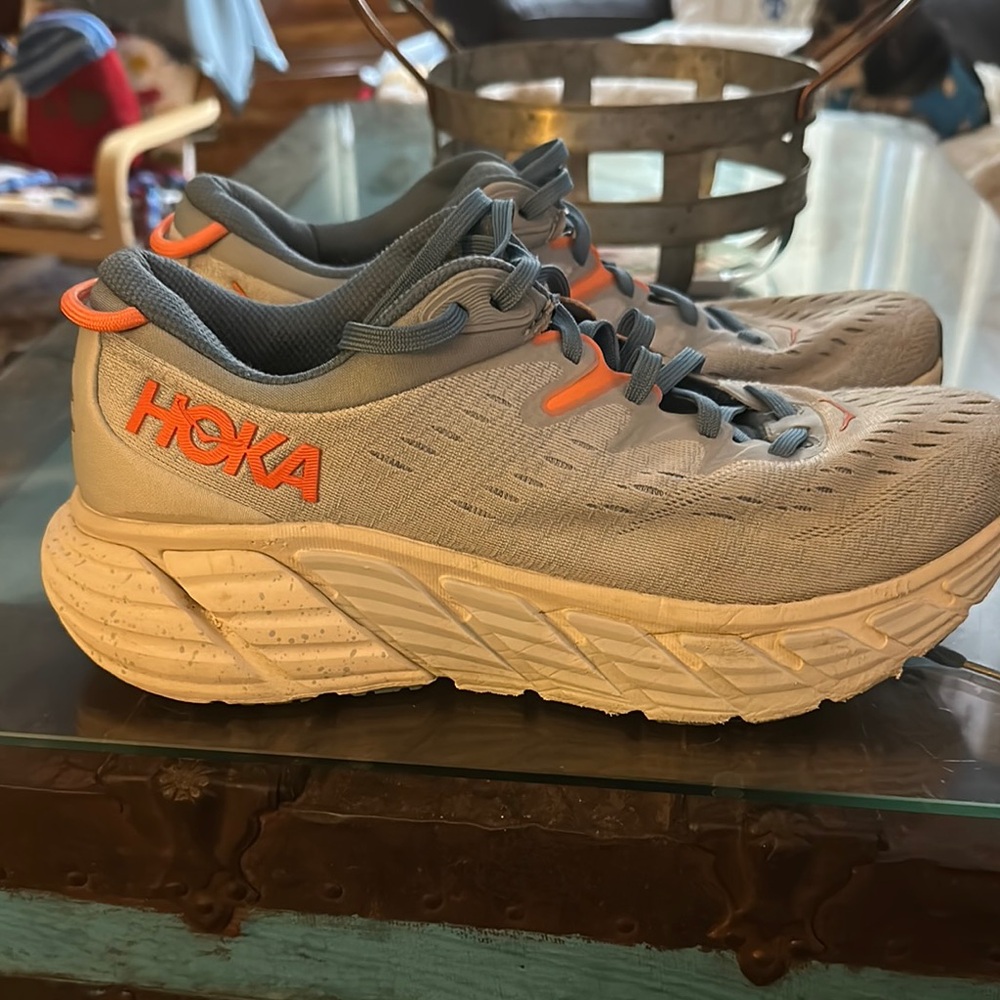 Hoka Light Gray and Bright Orange Sneakers